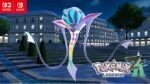 Promotional image for Pokémon Legends: Z-A showing Mega Malamar with glowing blue and purple head and rainbow-colored tendrils standing in Lumiose City at night, with Nintendo Switch and Switch 2 logos visible in the top corner.