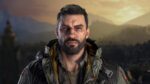 Close-up of Kyle Crane from Dying Light: The Beast, showing a weathered face with beard, glowing red eyes, and wearing a tactical jacket with yellow lining, set against a misty mountainous background.