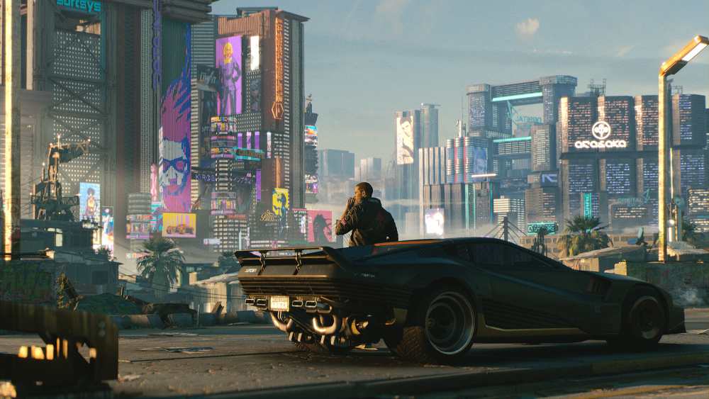 Night City skyline from Cyberpunk 2077 showing neon-lit streets and towering corporate buildings at night